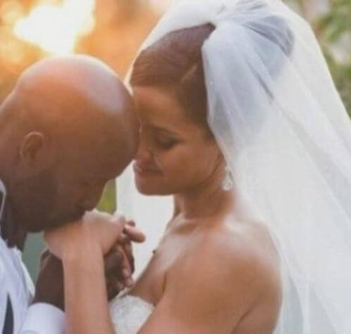 Melissa Ghoston and Lloyd Pierce special moment on their wedding day.